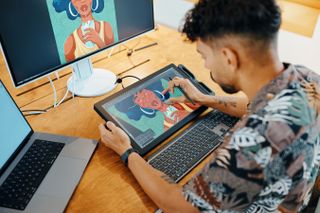 an artist uses the Wacom Cintiq Pro 17