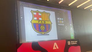 Adobe Photoshop on a big screen showing off new features